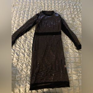 Black sequin sheer front dress with a velvet strip across chest and velvet back